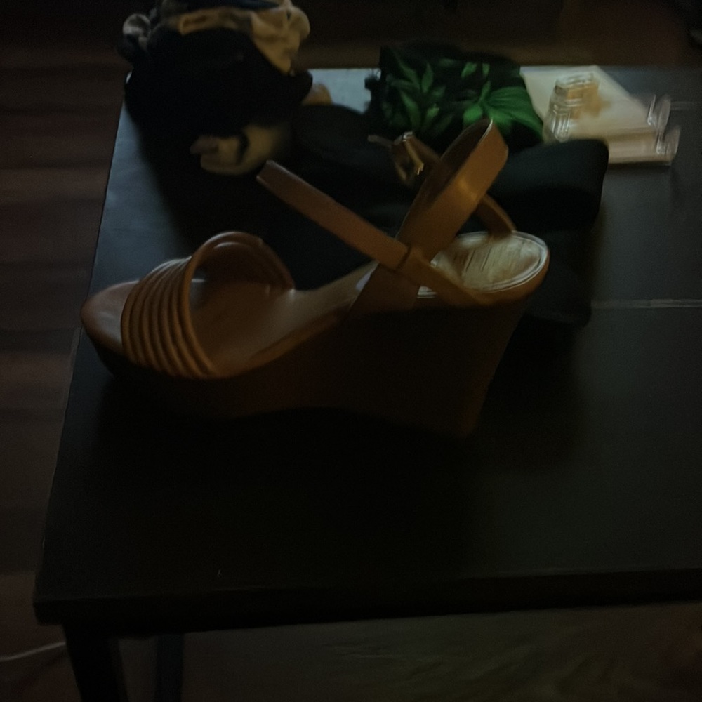A pair of light brown wedges size 81/2. Perfect fitting strap around the ankle. - Picture 3 of 10
